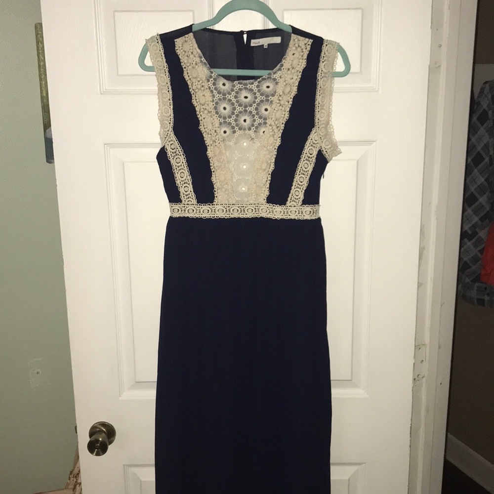 Navy and white maxi dress with sheer top and back.